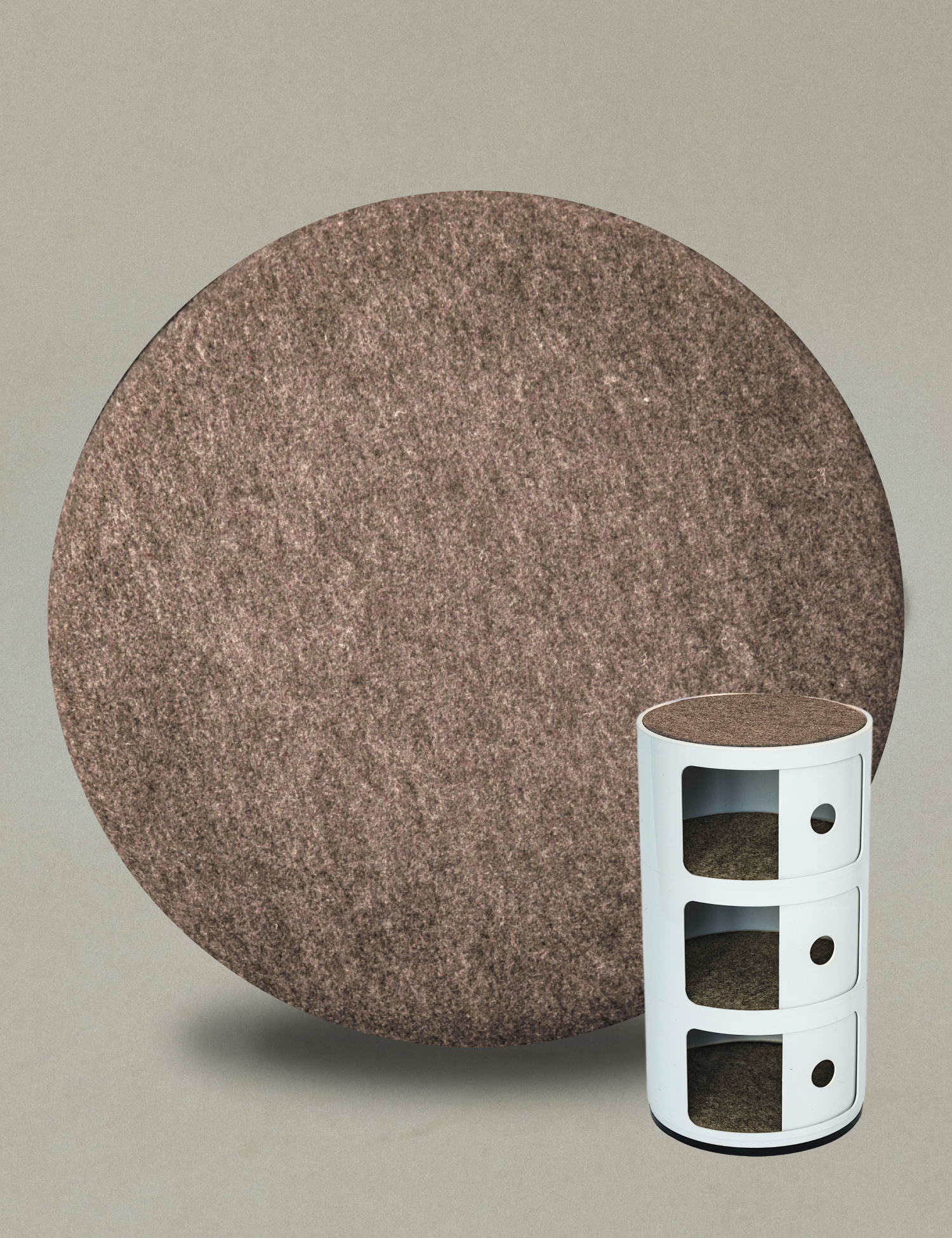 Kartell Componibili Auflage in Beige neben dem runden Container